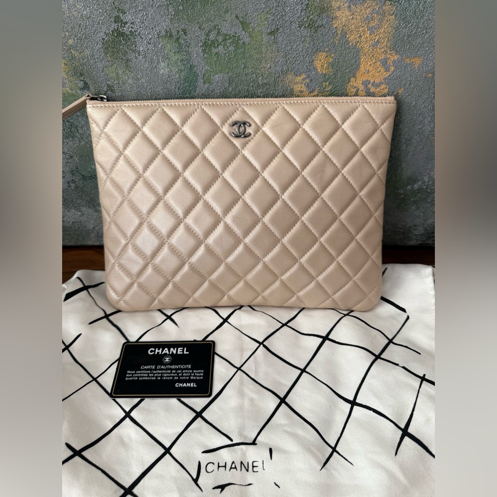 CHANEL Medium O Case Beige Pearl Quilted